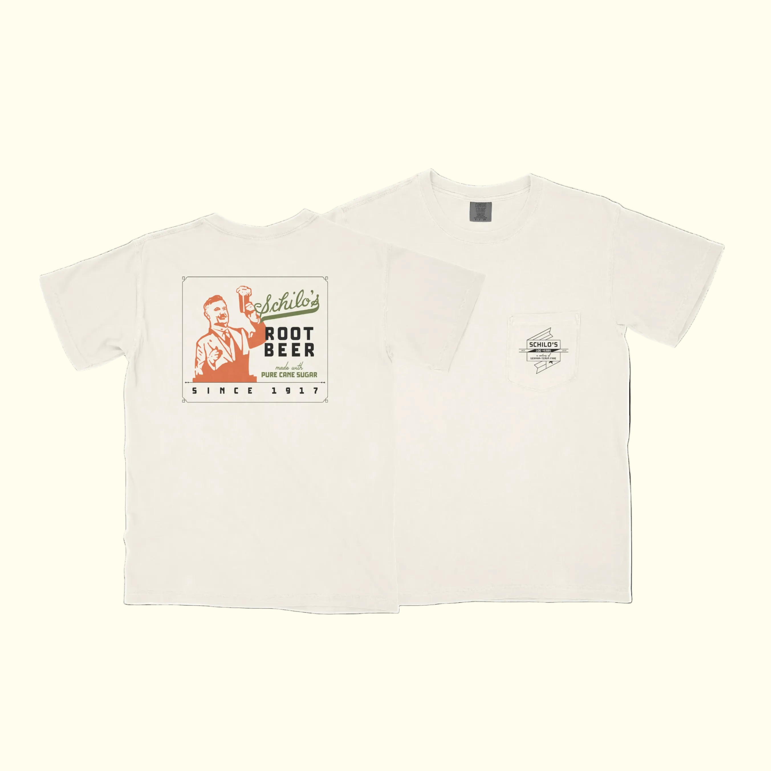 Beige t-shirt with vintage-style root beer label design on a white background
