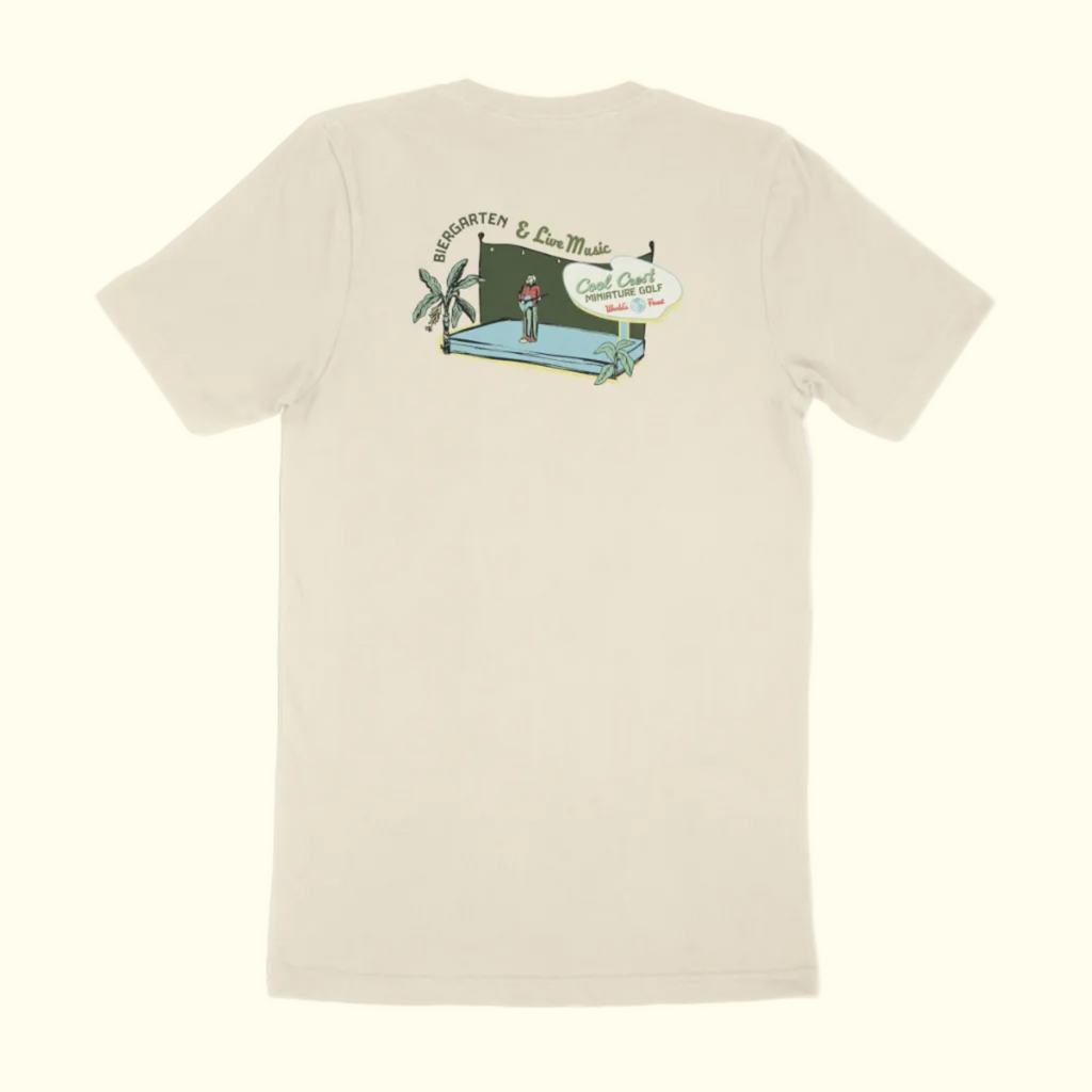 Beige t-shirt with a graphic design on the back against a white background