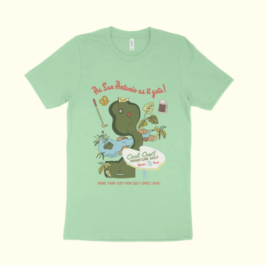 Light green t-shirt with a snake graphic and text on a white background