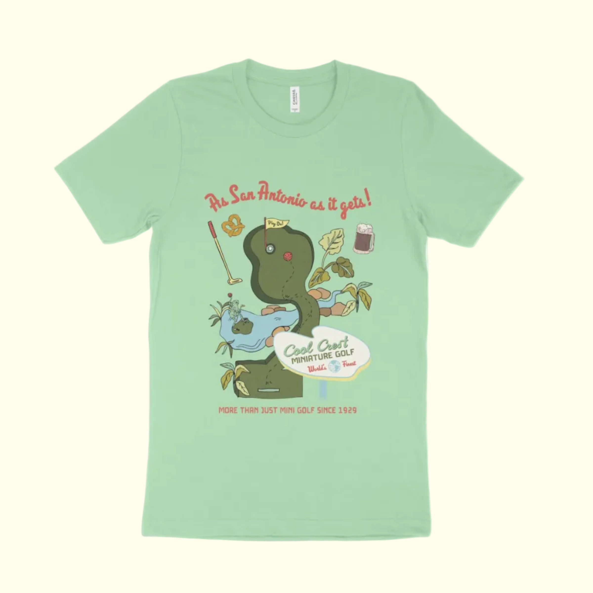 Light green t-shirt with a snake graphic and text on a white background